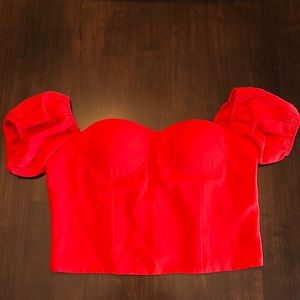 By Egreis red top